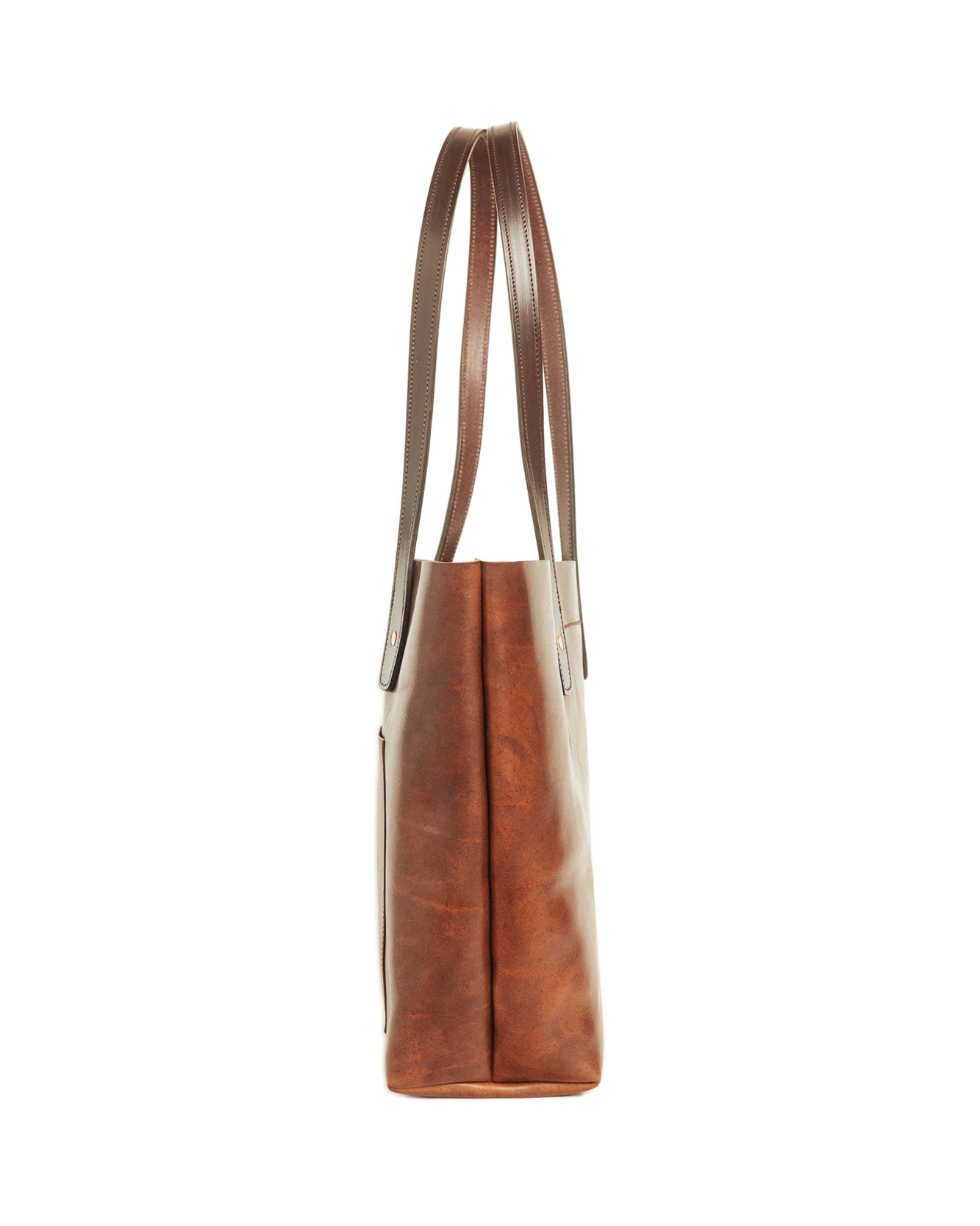 Brown leather tote bag on a white background