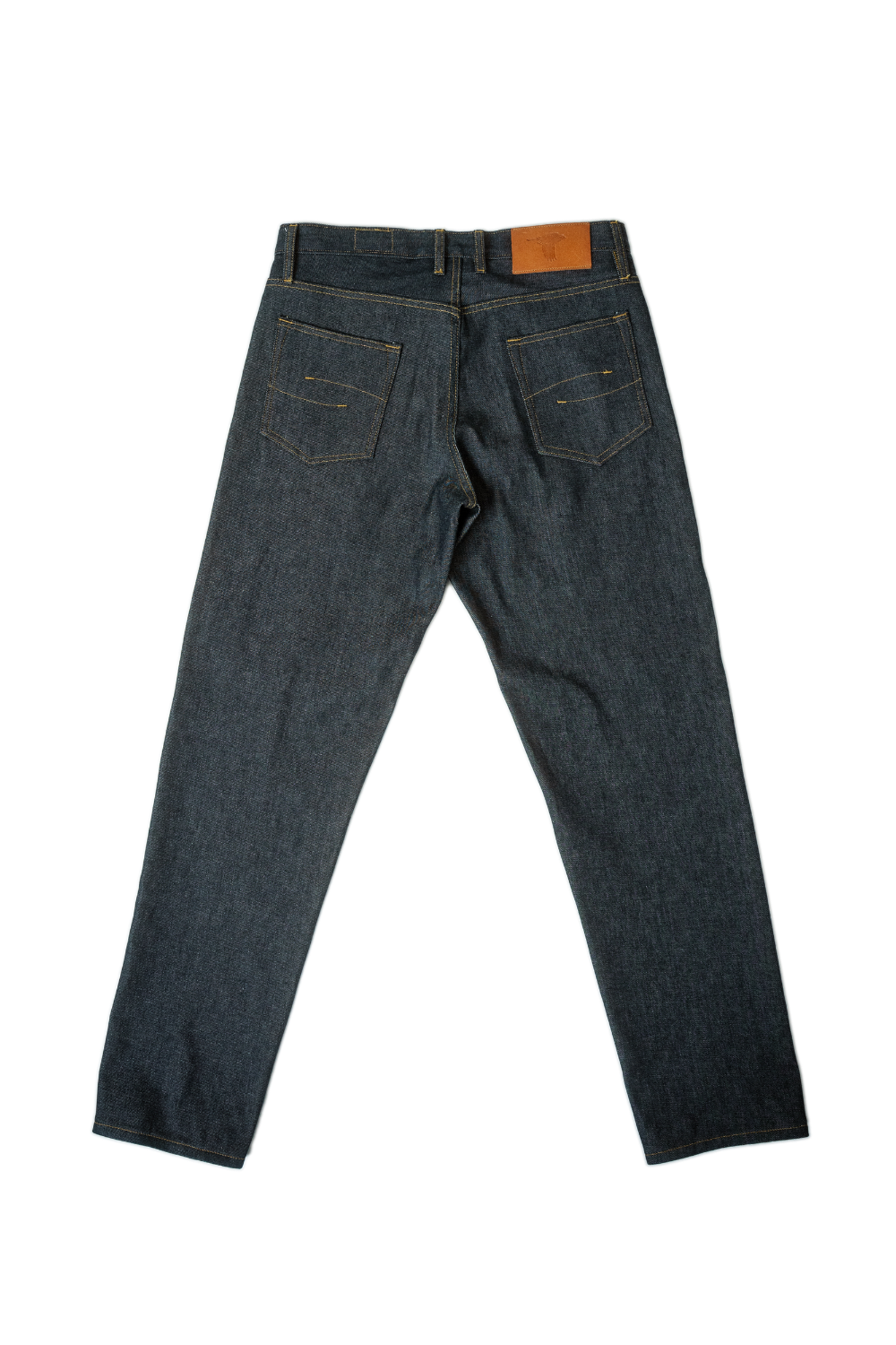 Pair of dark blue jeans on a white background