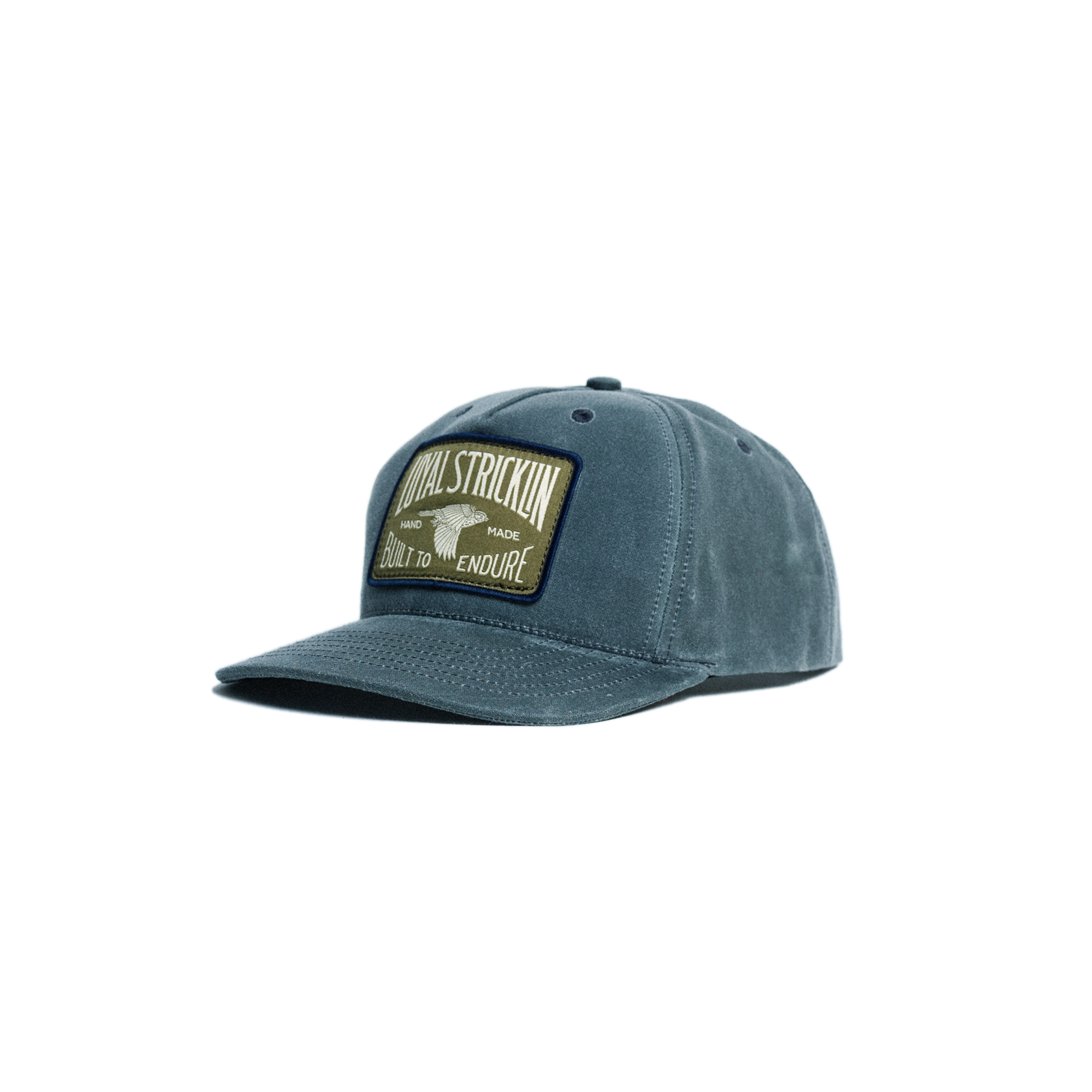 Blue cap with a patch on a white background